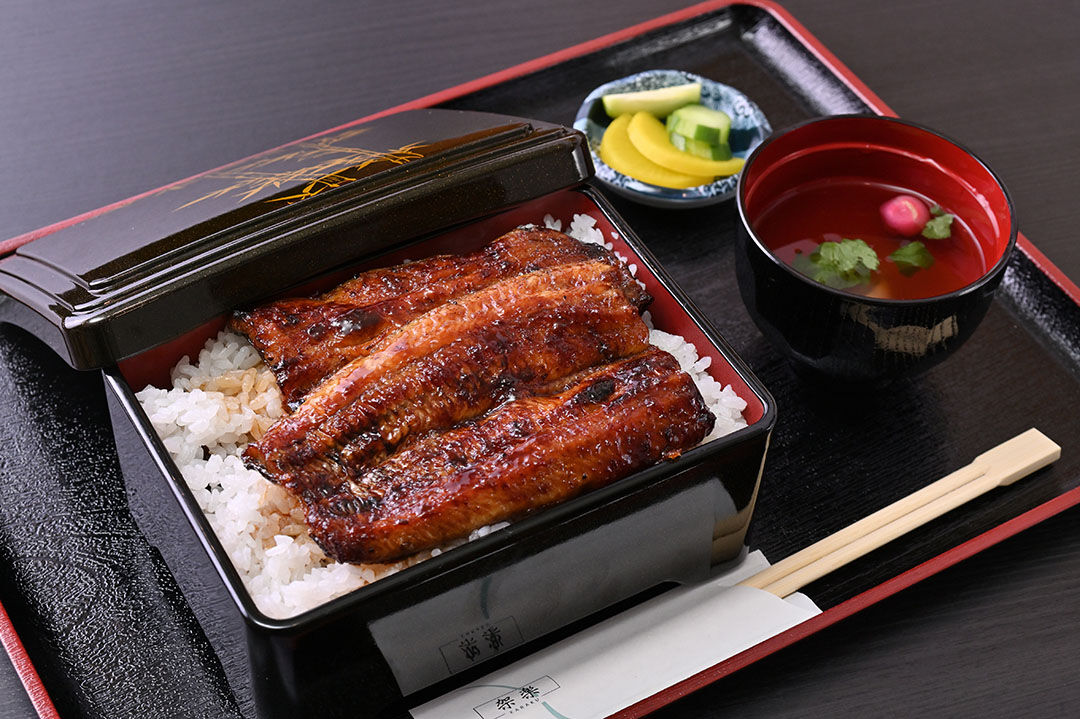 店主が一尾ごとに焼き分ける至高のうな重